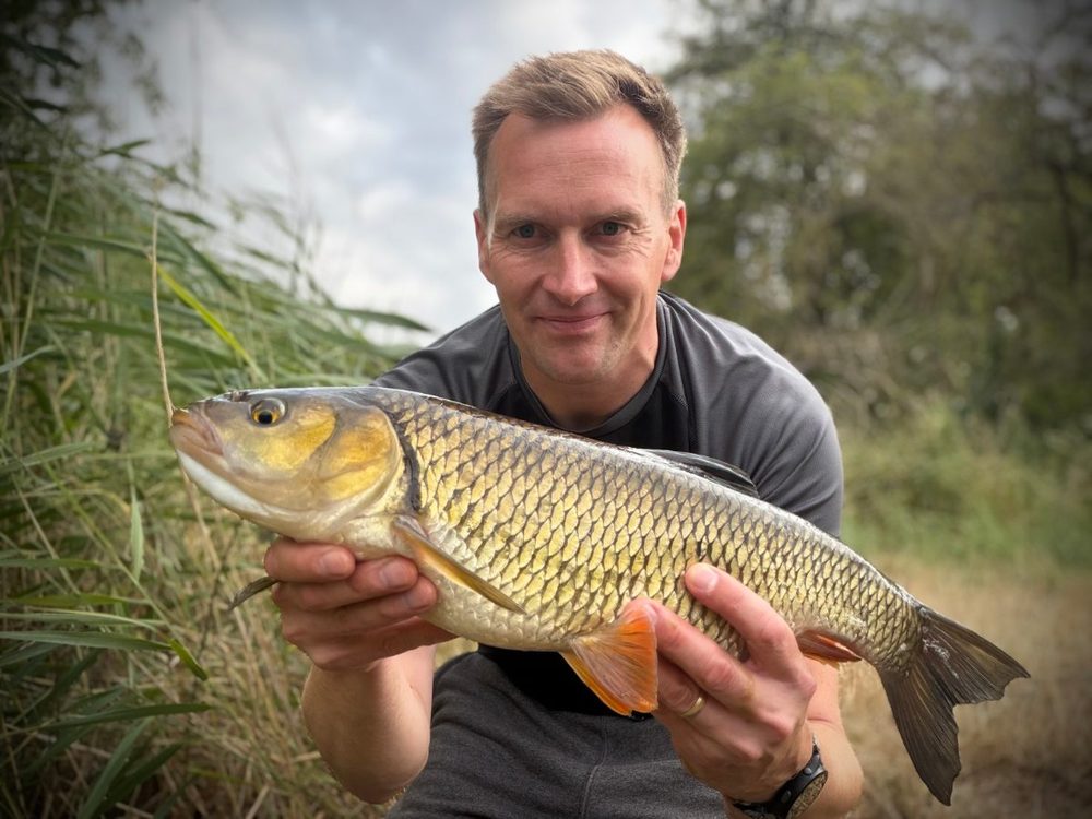 Stewart Pryke holding a 4lb chub at Wellington Fishery