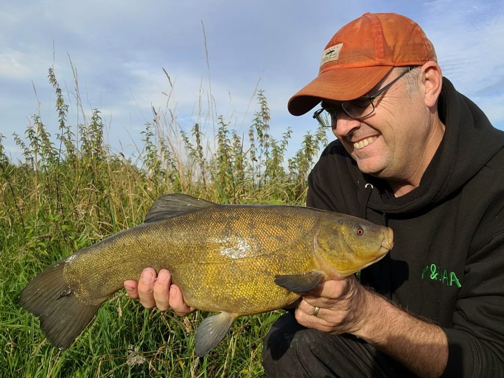 Martin Barnatt holding a 6lb 4oz tench from the River Welland